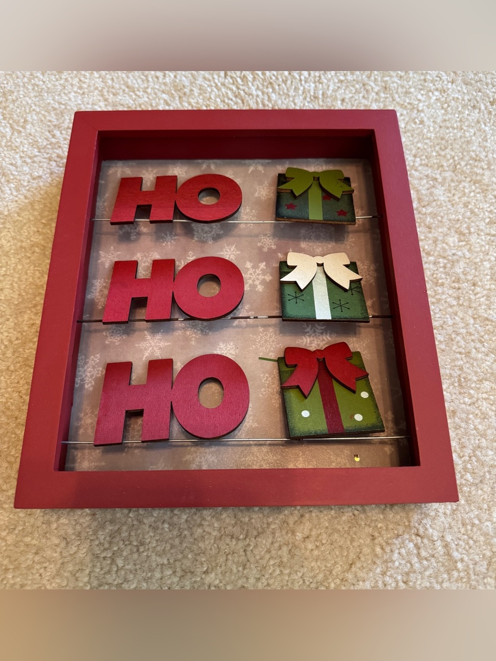 Festive 'HO HO HO' Wall Frame with Green Gift Accents